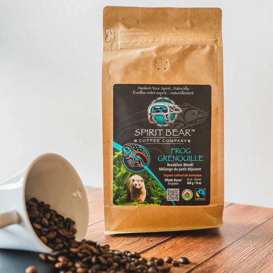 Bag of Spirit Bear Frog Grenouille coffee beside spilled beans