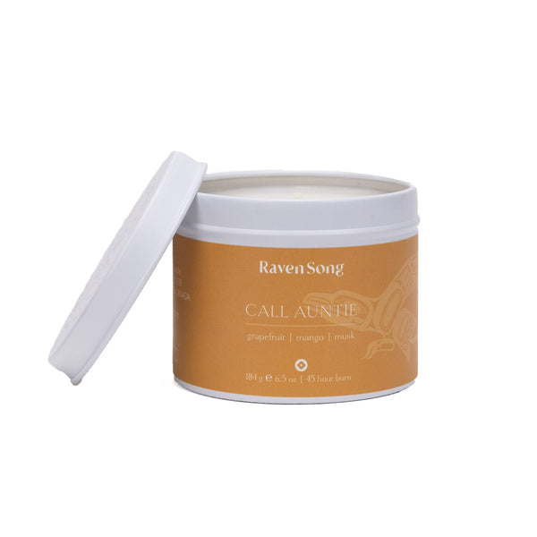 Candle jar with 'Raven Song' branding