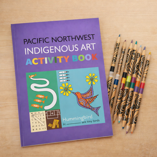 Pacific Northwest Indigenous Art Activity Book with colorful pencils on a wooden surface