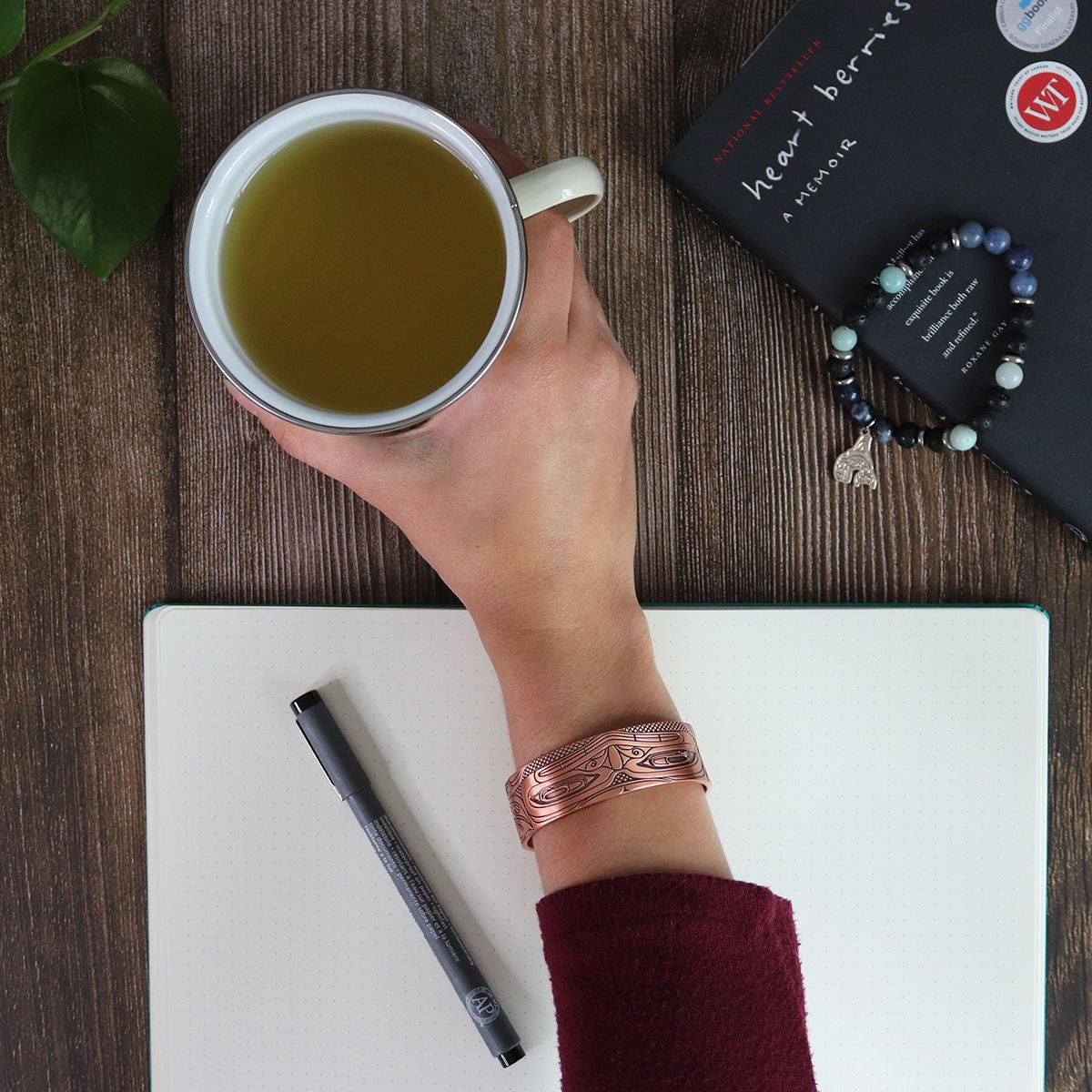 Copper Plated Bracelet - Grizzly Bear by Andrew Williams (Haida) — flat lay