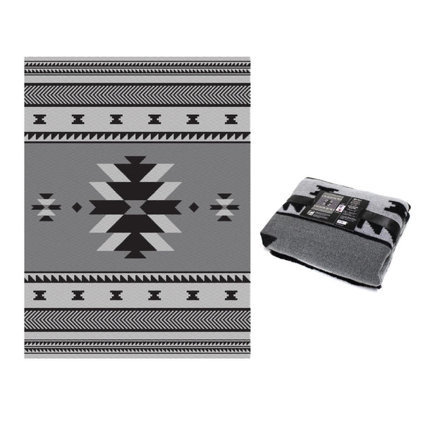 Gray and black patterned blanket with a geometric design