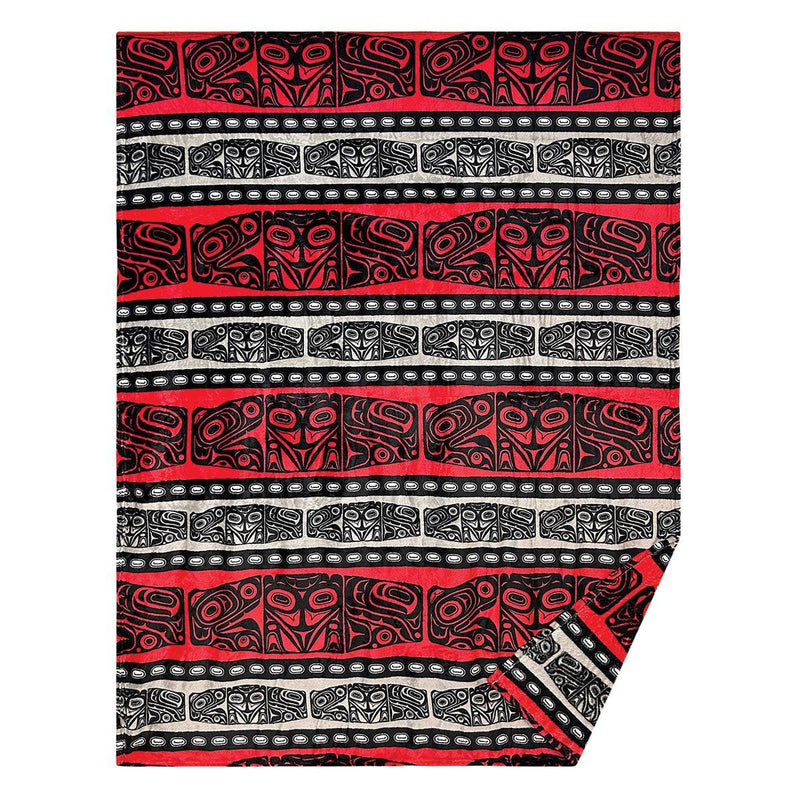Red and black blanket with Indigenous design Empowermnet printed on