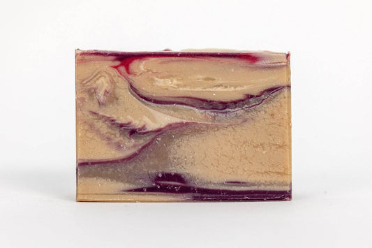 Marbled soap bar with purple and beige colors