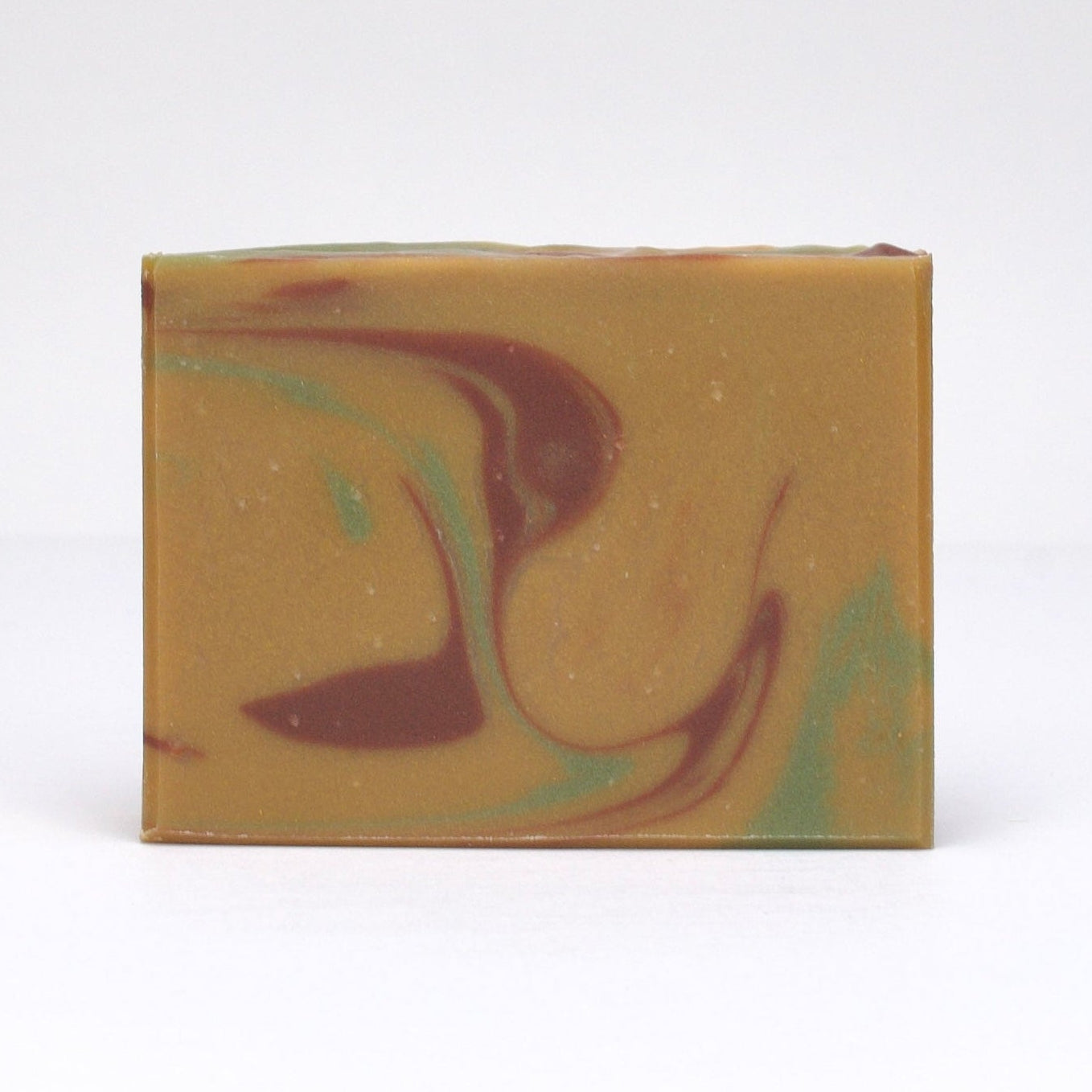 Sacred Tobacco bar soap by RavenSong, amber bar with brown and green swirls