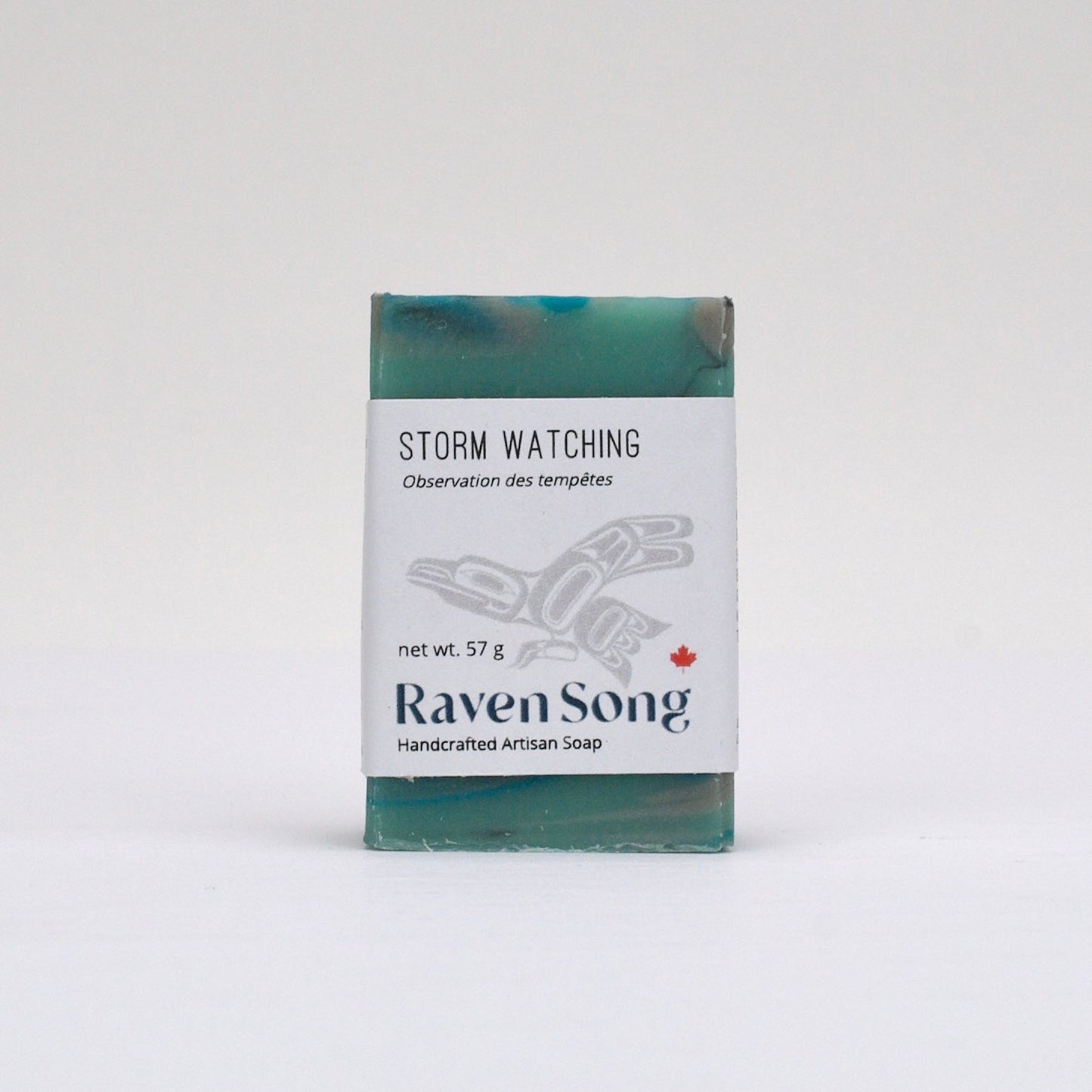 RavenSong Storm Watching textured-top soap bar in teal and green, wrapped in a white RavenSong label