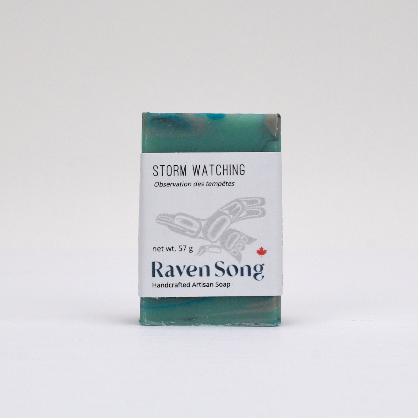RavenSong Storm Watching textured-top soap bar in teal and green, wrapped in a white RavenSong label