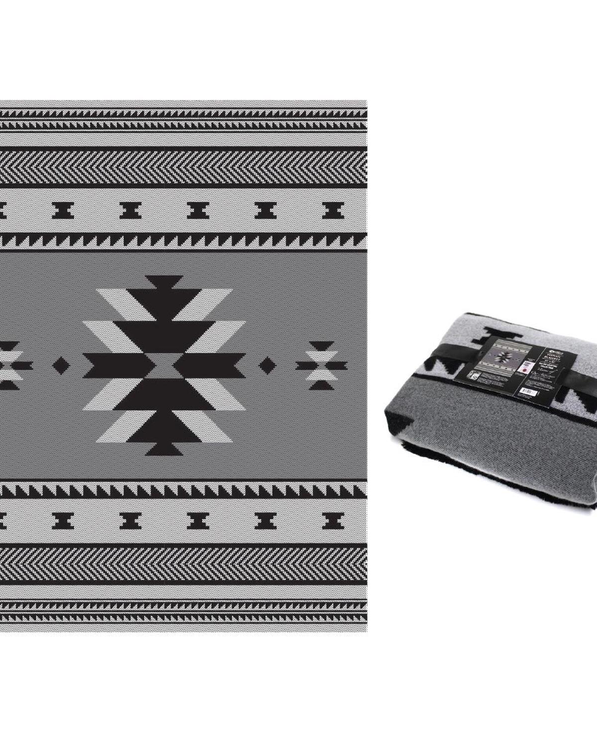 A woven blanket with a geometric Coast Salish design