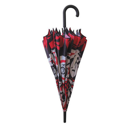 Pacific Umbrella Thunder Moon by Indigenous Artist Joe Wilson-Sxwaset folded into its compact size displayed in front of a white background