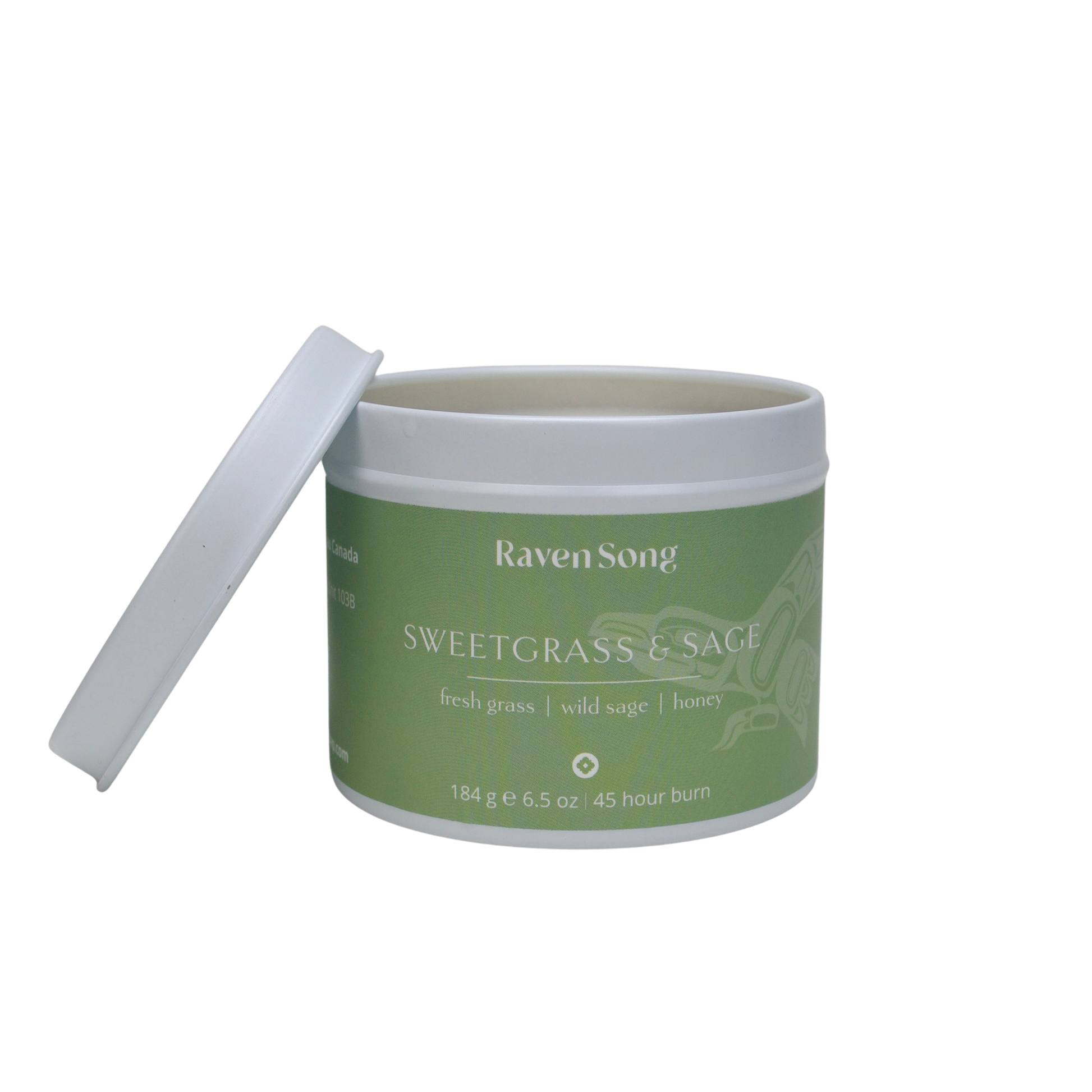 Sweetgrass and Sage coconut wax candle by RavenSong in a green tin, fresh grass wild sage and honey