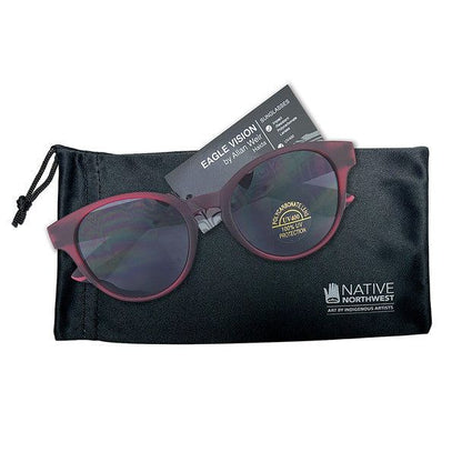 Eagle Vision sunglasses by Haida artist Allan Weir shown on top of the sunglasses case
