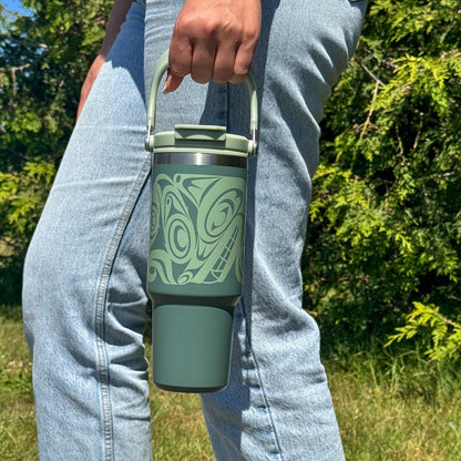 Urban Wolf 30oz tumbler carried by the easy-carry handle outdoors