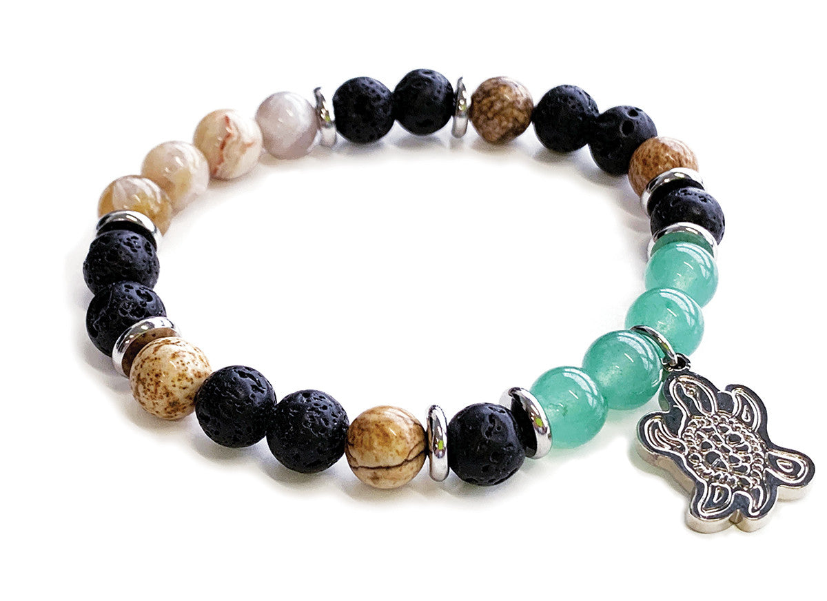 Stretch bracelet of green aventurine, picture jasper, bamboo agate and lava beads with a turtle charm