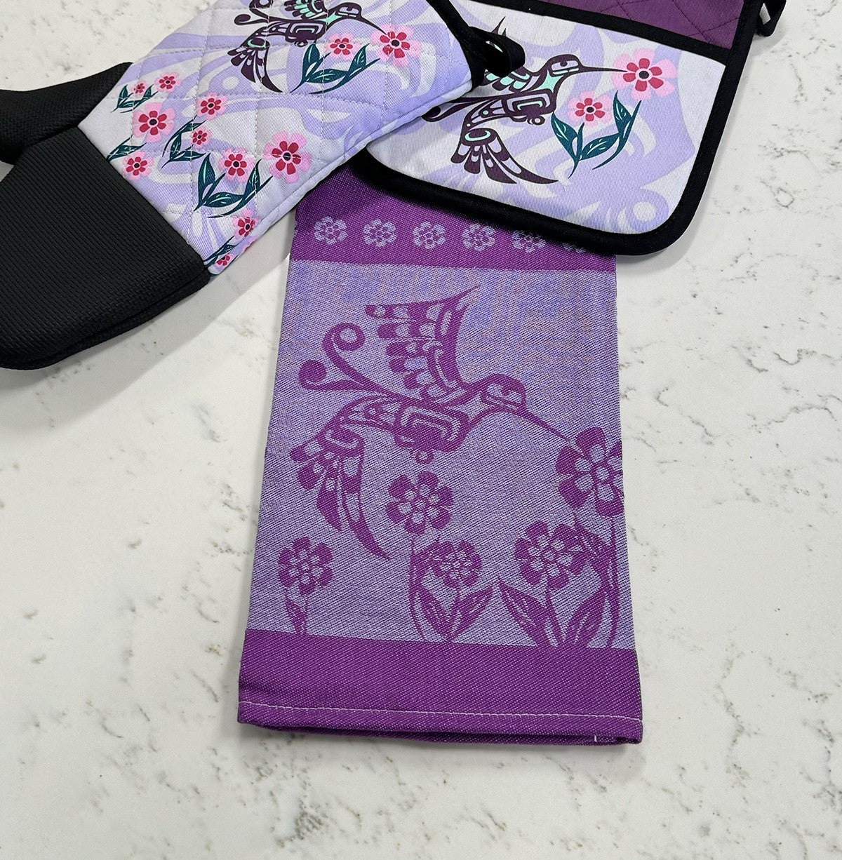 Hummingbird jacquard tea towel shown folded, alternate view