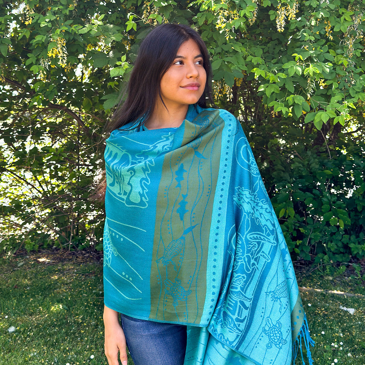 All My Relatives shawl draped over shoulders