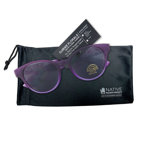 Purple glasses florals by Storm Angeconeb laying on top. of glasses case