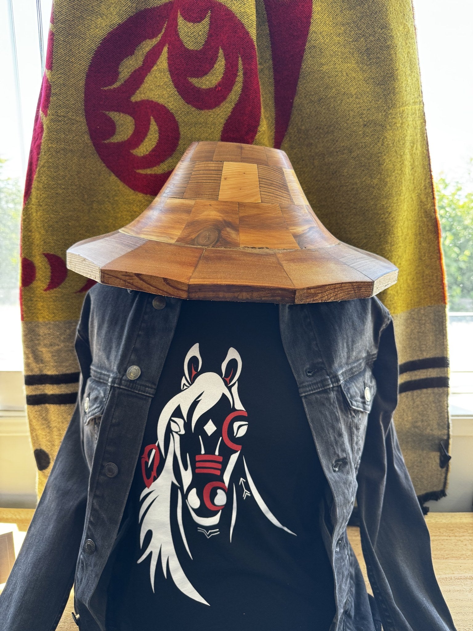 Cedar hat form shown worn like a hat, showing the wide brim and rounded crown