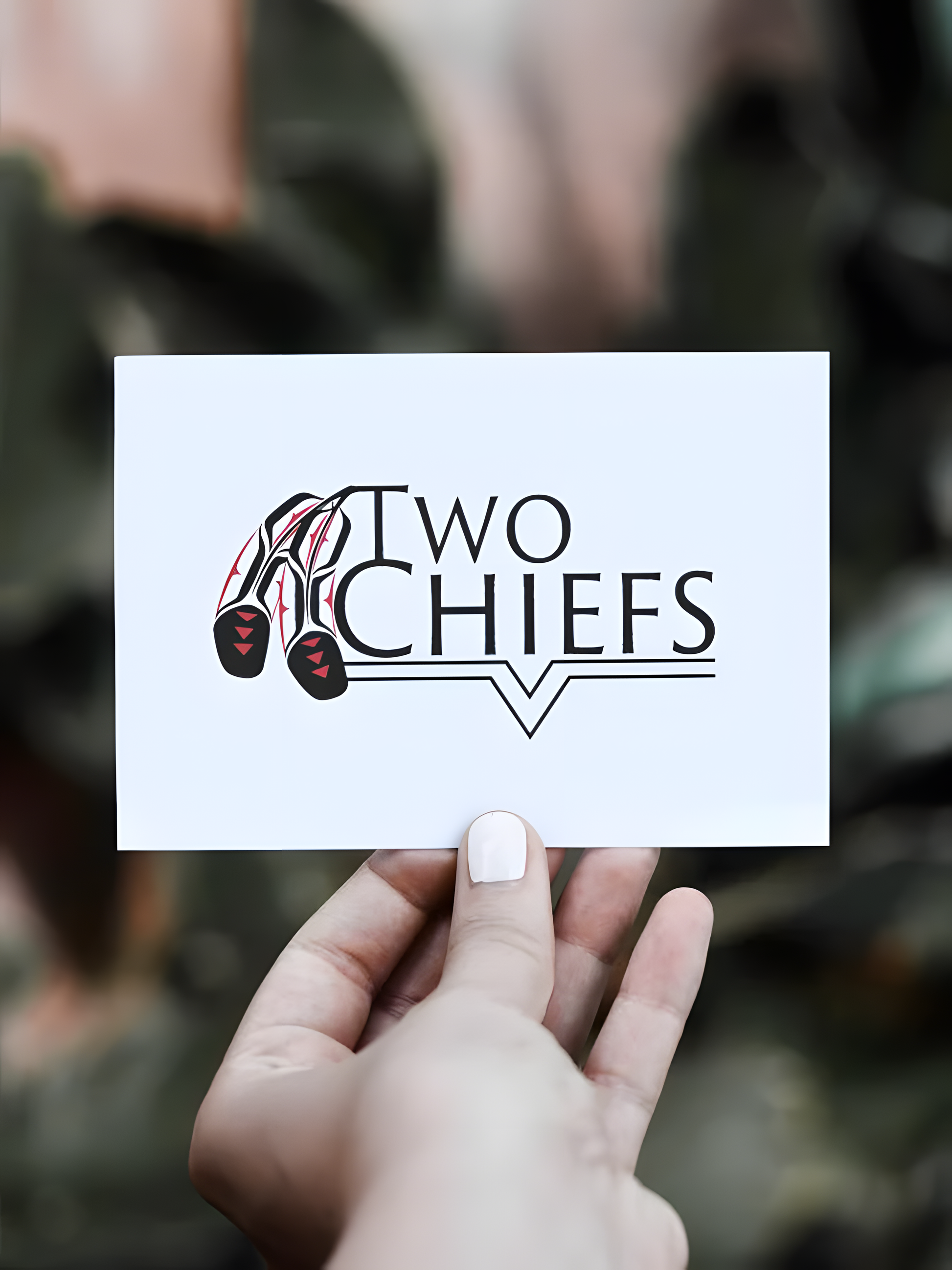 Person holding a TwoChiefs digital gift card
