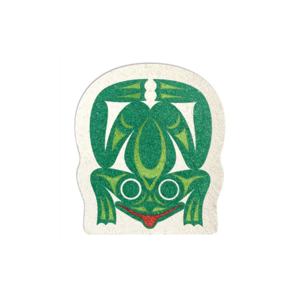 Frog-shaped eco sponge with a green front-facing frog and red mouth designed by Maynard Johnny Jr. on a natural sponge