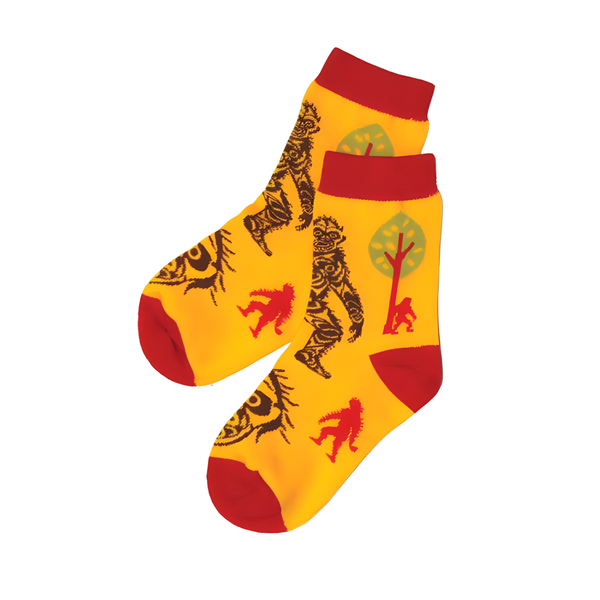Yellow and red socks with Indigenous Sasquatch design