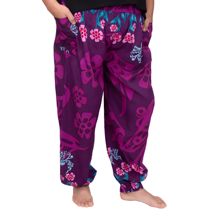 Purple pants with Indigenous floral and hummingbird design
