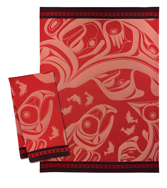 Red and pink tea towel with Indigenous salmon design pattern and dark red trim