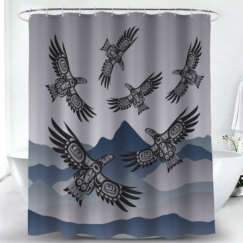 Shower curtain with black eagle designs on a gray and blue background