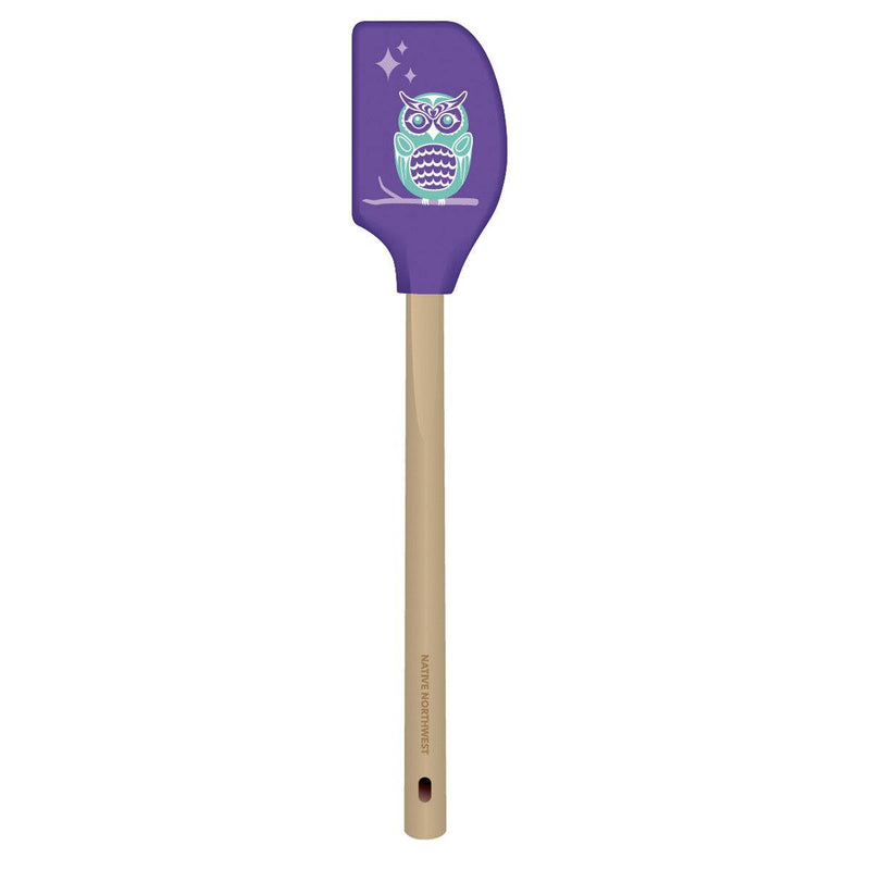 Purple spatula with owl design on a white background