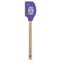 Purple spatula with owl design on a white background